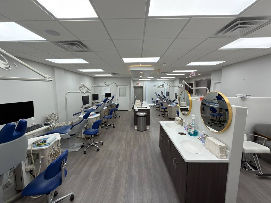 Open orthodontic treatment bay with blue chairs at the Milwaukee office
