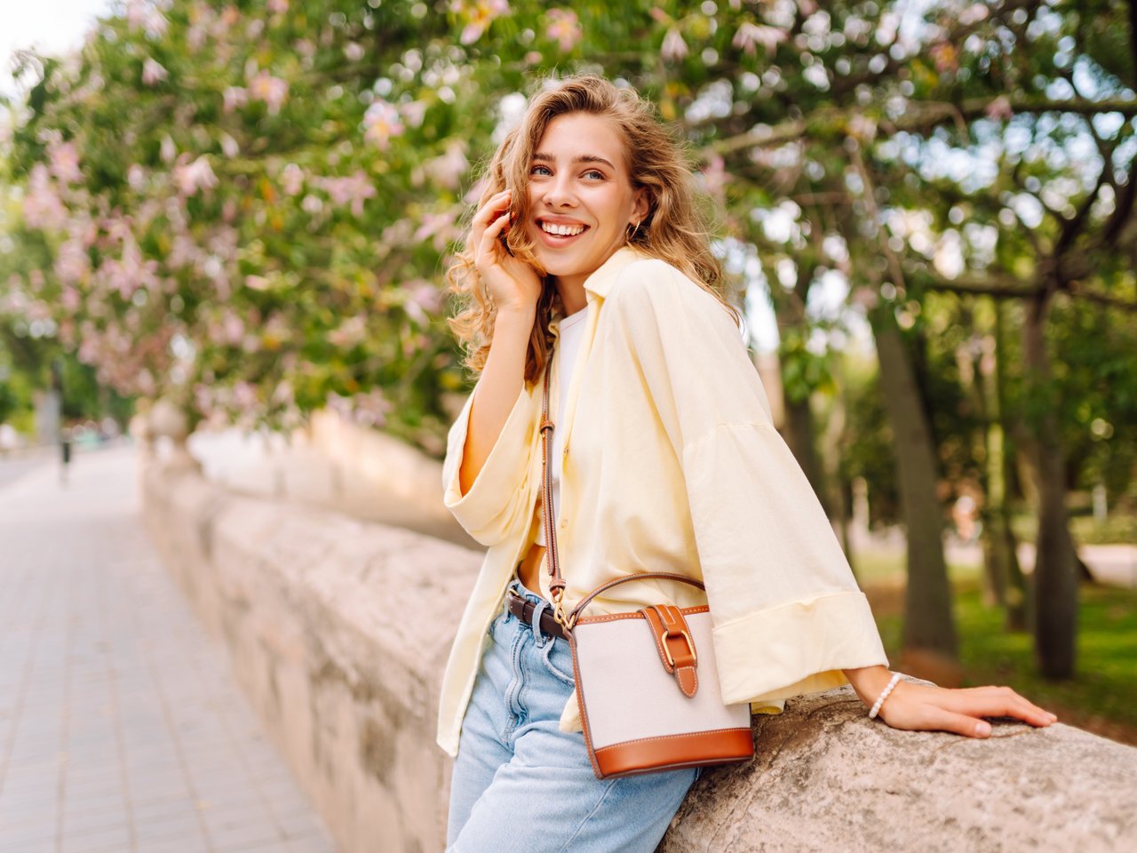 Patient smiling after orthodontic treatment at NuLine Orthodontics in Beloit, WI